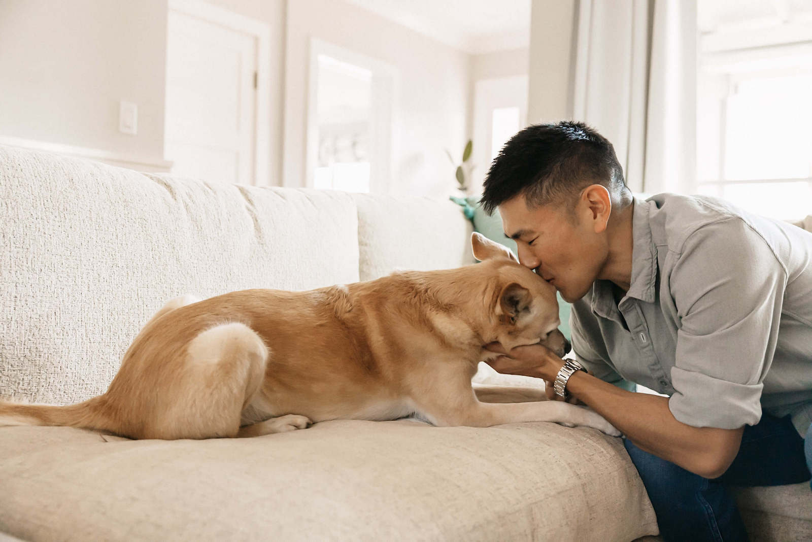 Man Kissing Dog